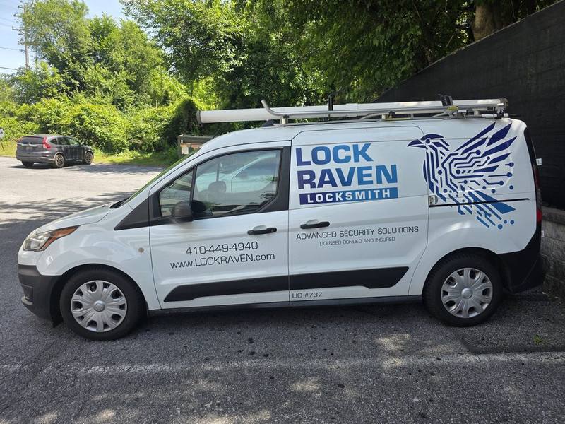Lock Raven service van parked on a job
