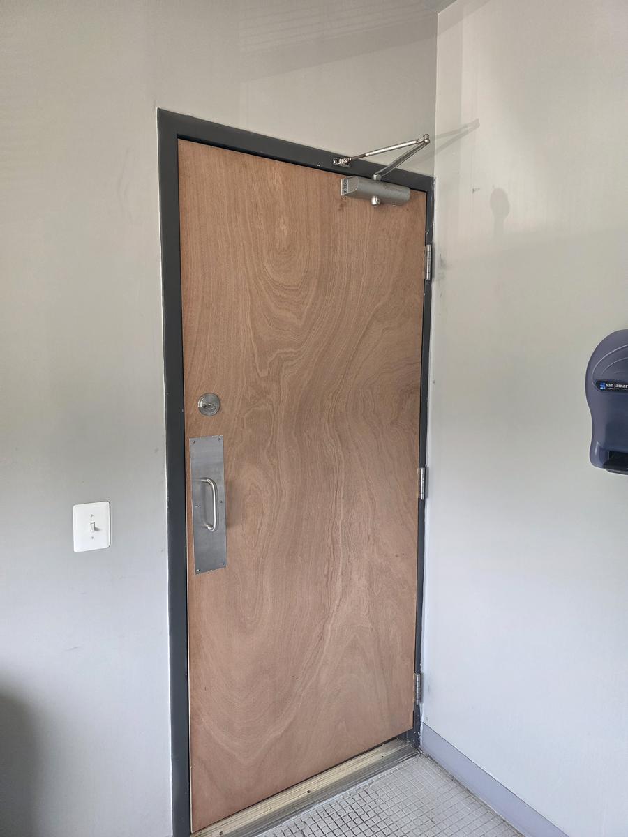 Commercial door installation with closer and deadbolt hardware